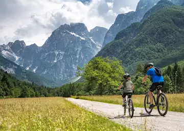 Father and son on a cycling trip in the Alps